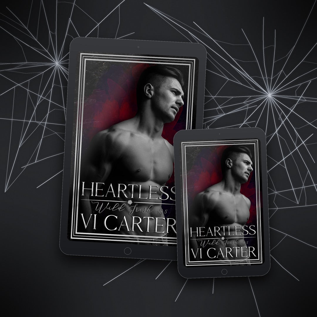 Two tablet devices displaying the cover of 'Heartless' by VI Carter on a dark background with spider web design.