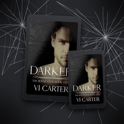 Two tablets displaying the book cover of 'Darker' by Vi Carter on a dark background with spider web design.