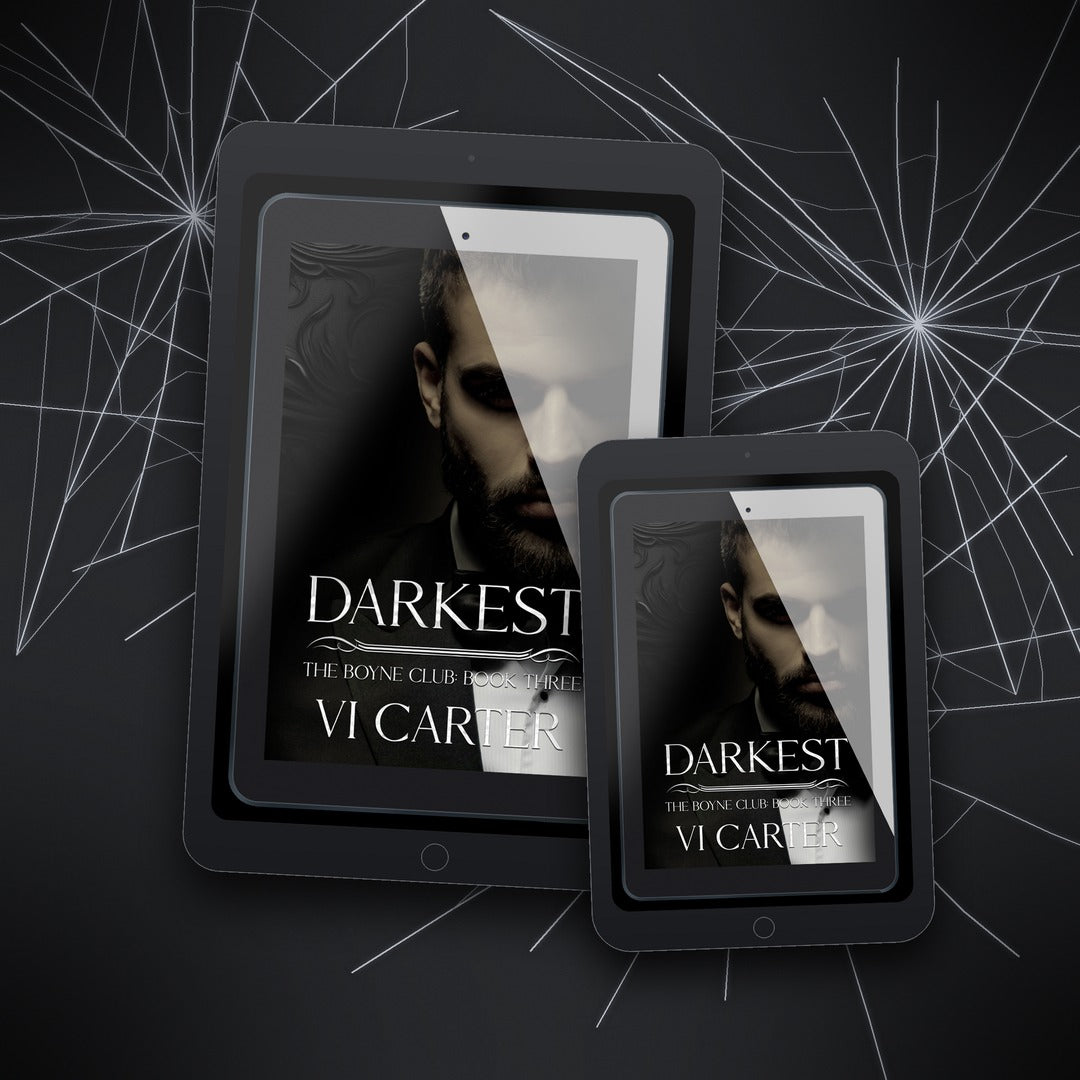 Two tablets displaying the cover of 'Darkest' by Vi Carter on a dark background with spider web design.