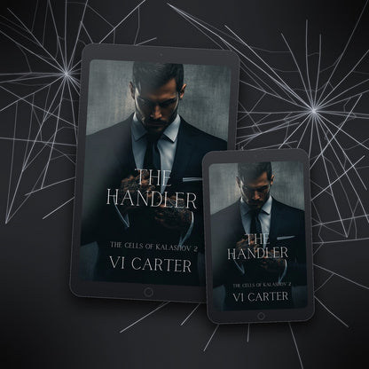 Tablet and smartphone displaying 'The Handler' book cover by Vi Carter on a dark background with spider web design.