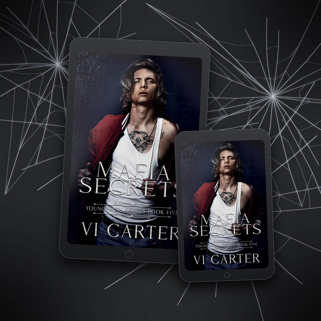 Two tablets displaying the cover of 'Mafia Secrets' by Vi Carter on a dark background with spider web design.