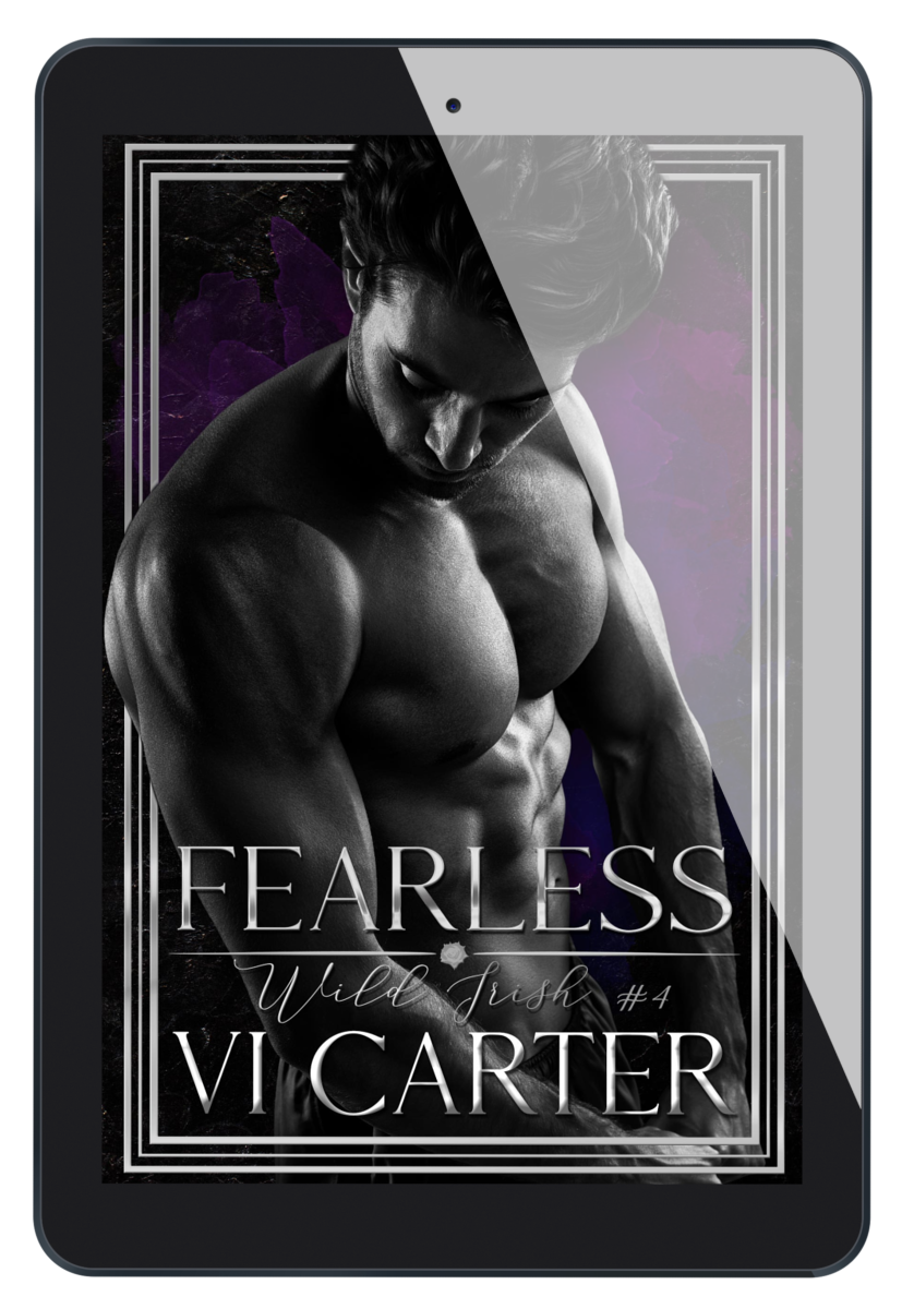 E-book cover of a romance novel titled 'FEARLESS' with the author's name, Vi Carter, displayed. The cover features a monochrome image of a man with a serious expression.