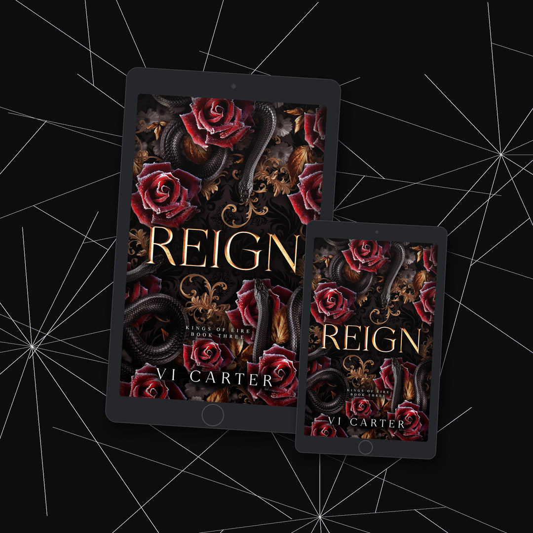 Two tablets displaying the book cover of 'Reign' by Vi Carter against a dark background with spider web design.